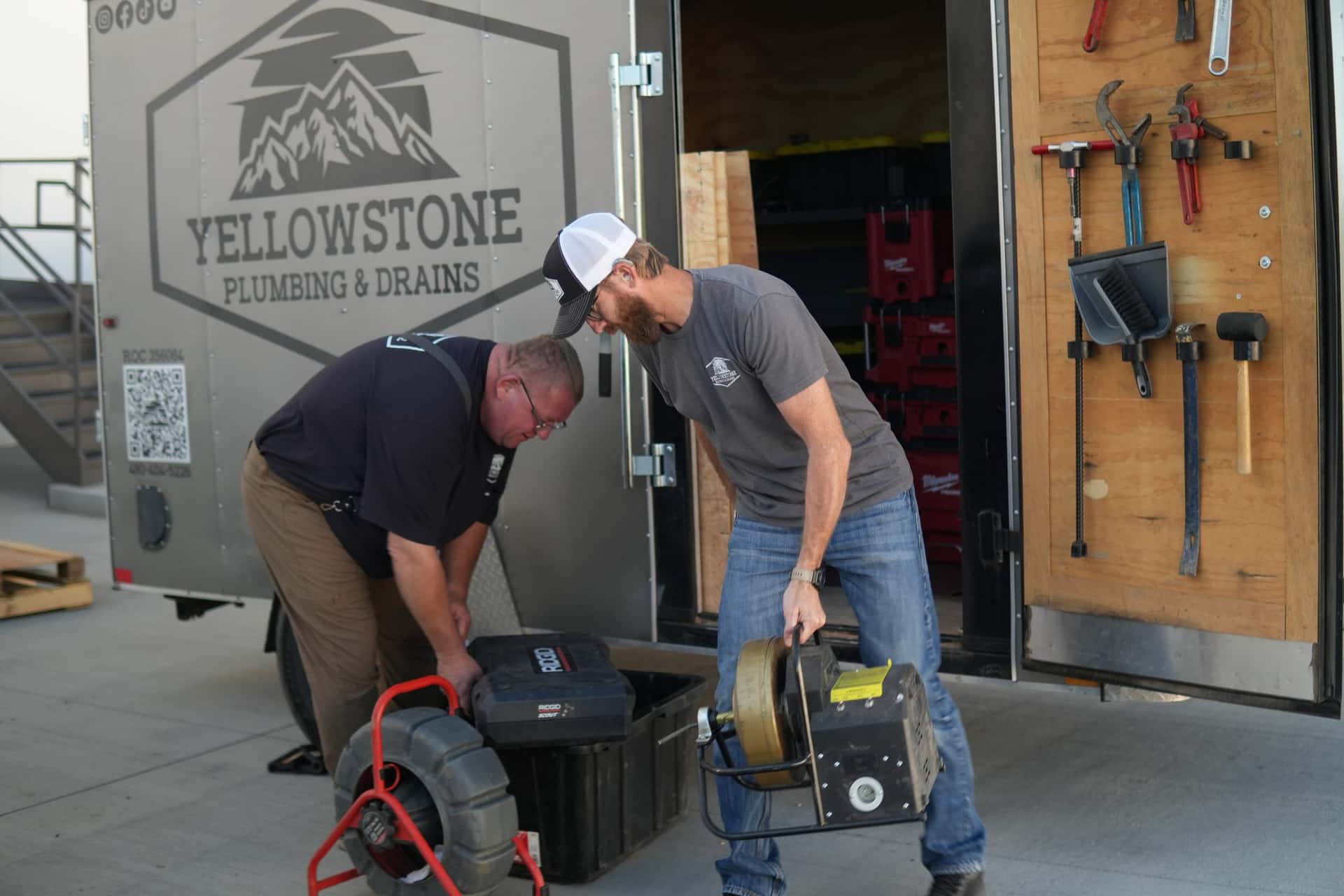 Sewer camera inspection equipment in the back of a Yellowstone van