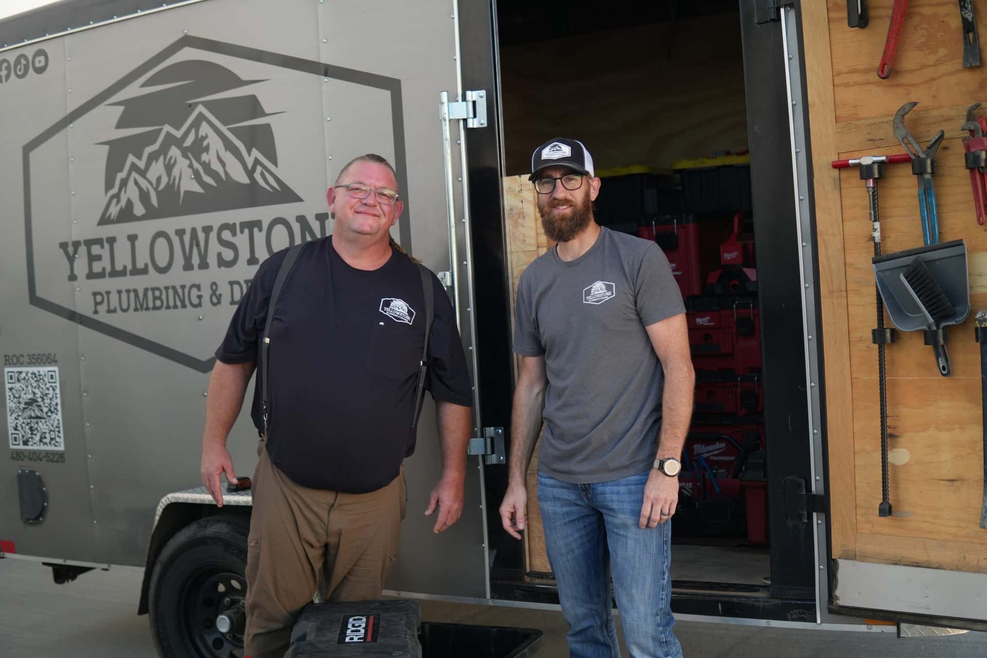 The Yellowstone Plumbing & Drains team in front of the service trailer